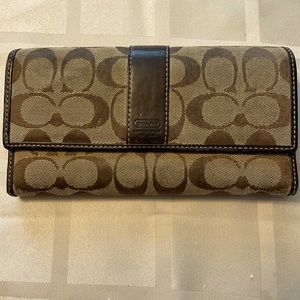 Authentic Coach wallet. Gently used and in good condition.